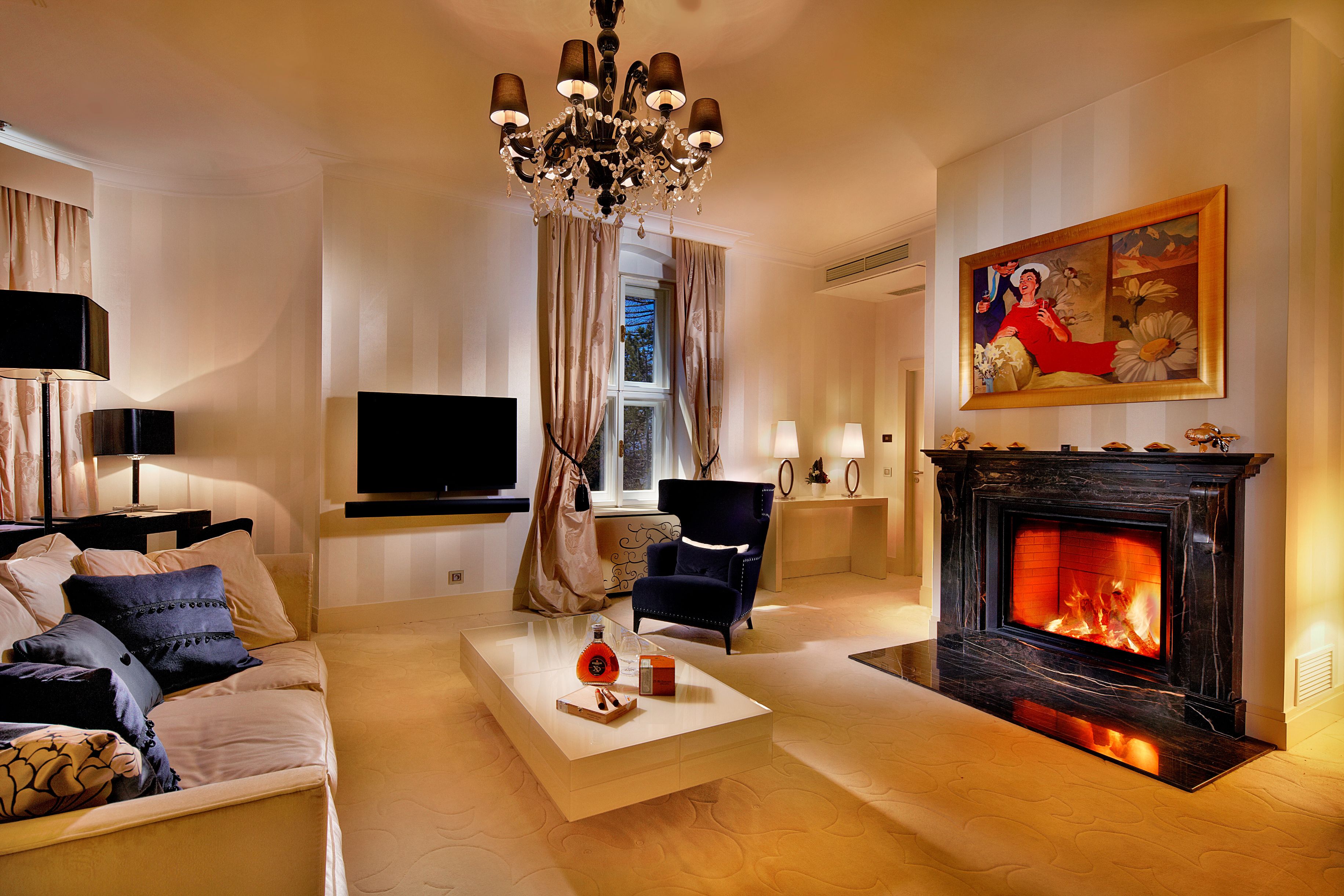 a living room with a fireplace and a couch