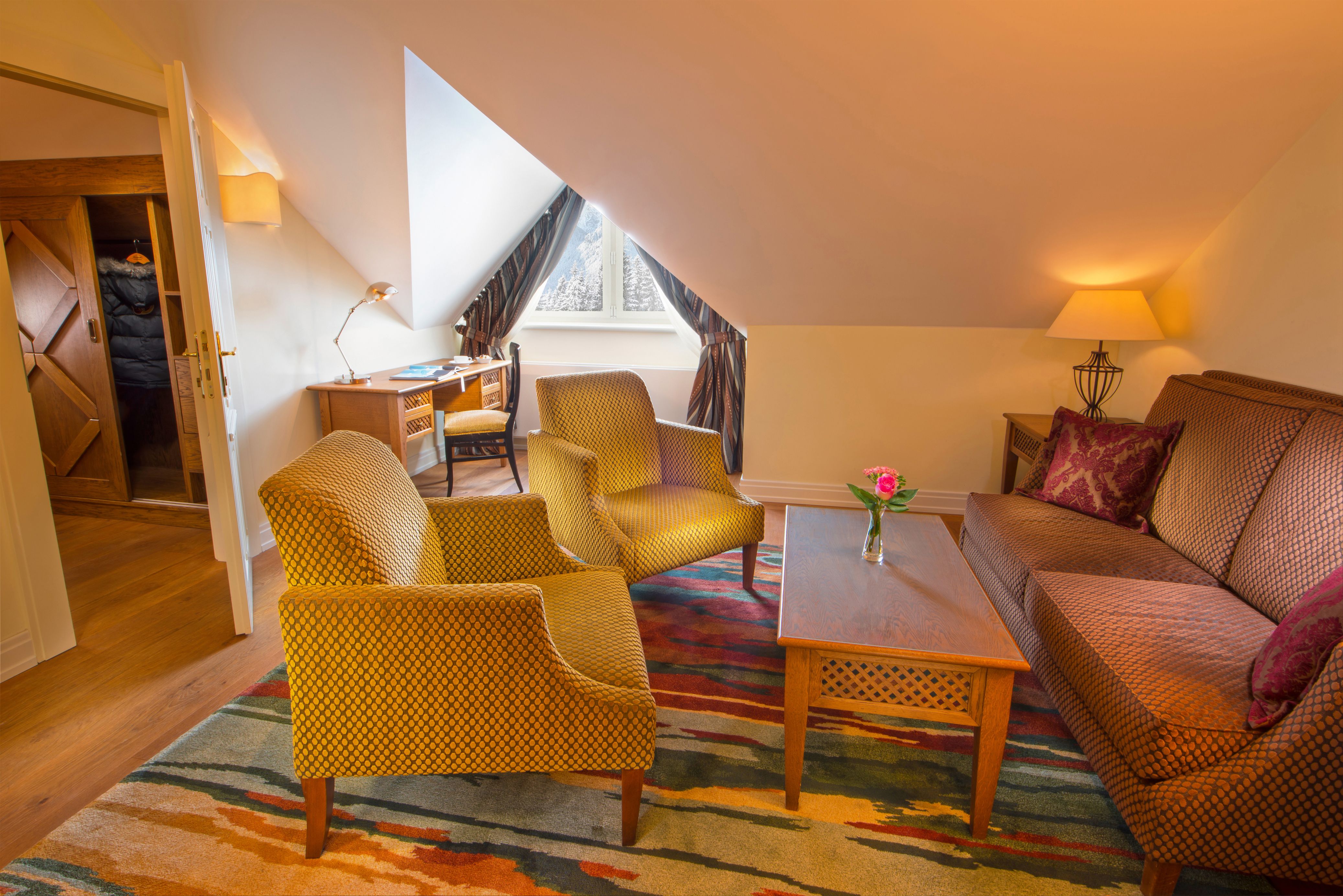 a room with a table and chairs