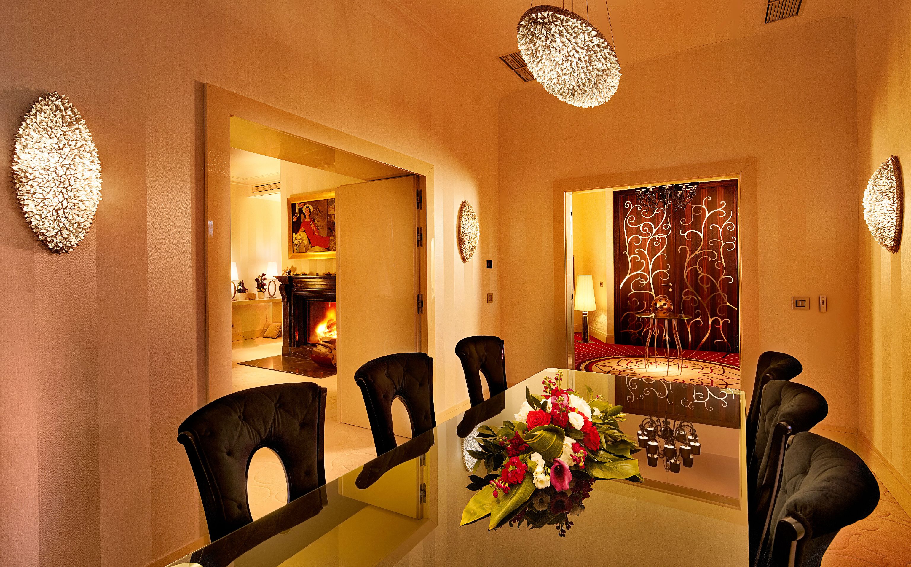a dining room with a table and chairs
