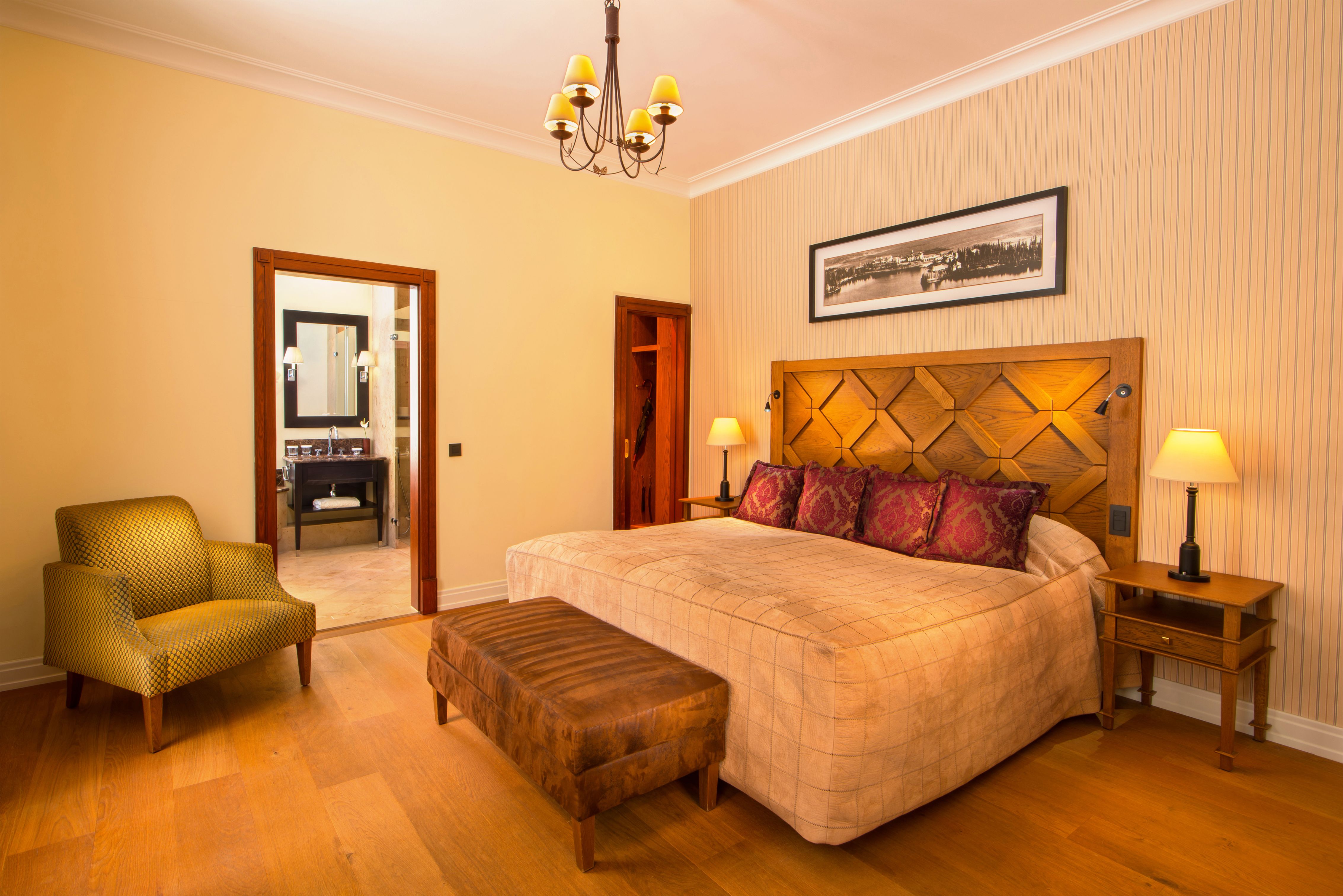 a bedroom with a bed and a chair
