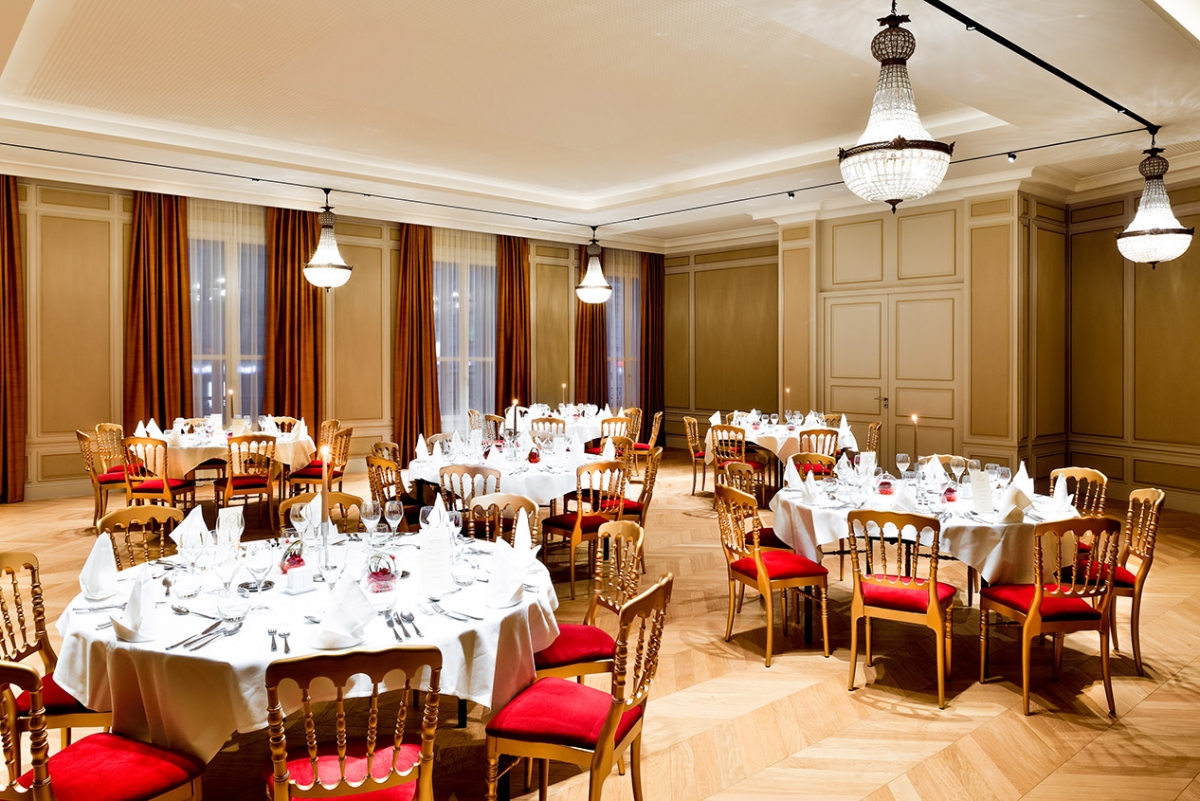 a room with tables and chairs