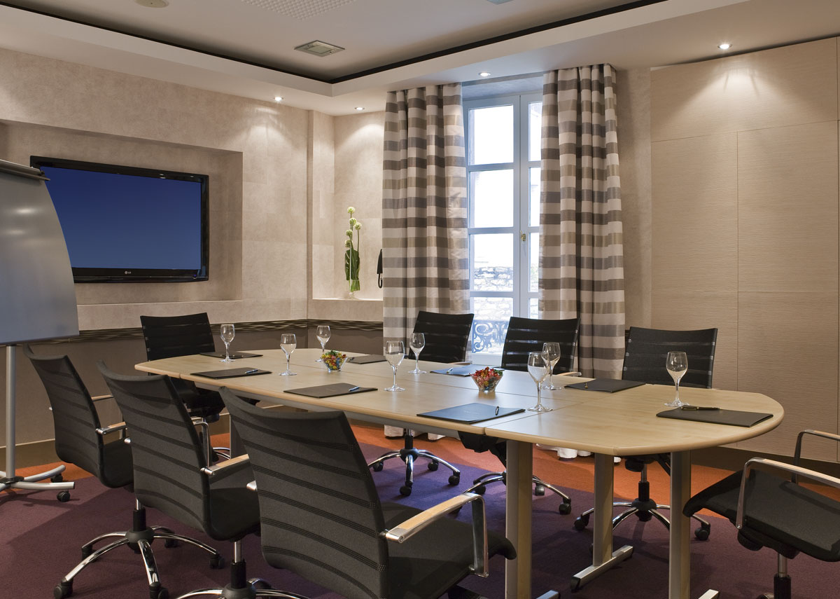 a room with a table and chairs
