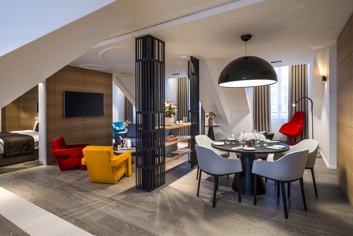a room with a table and chairs