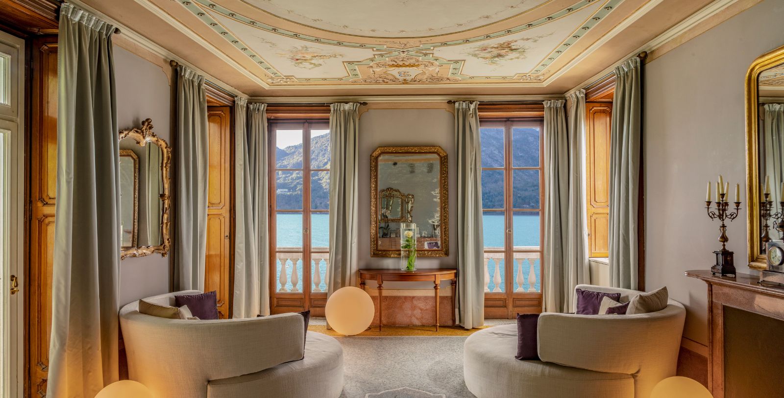a room with a large mirror and chairs