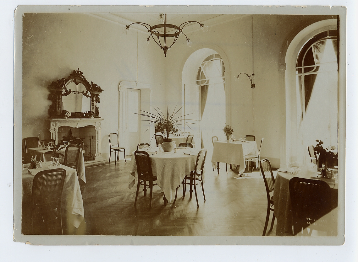 a room with tables and chairs