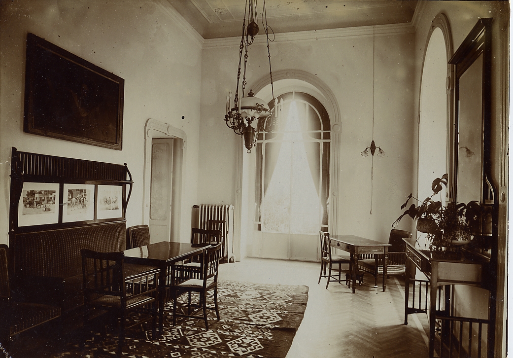 a room with a table and chairs