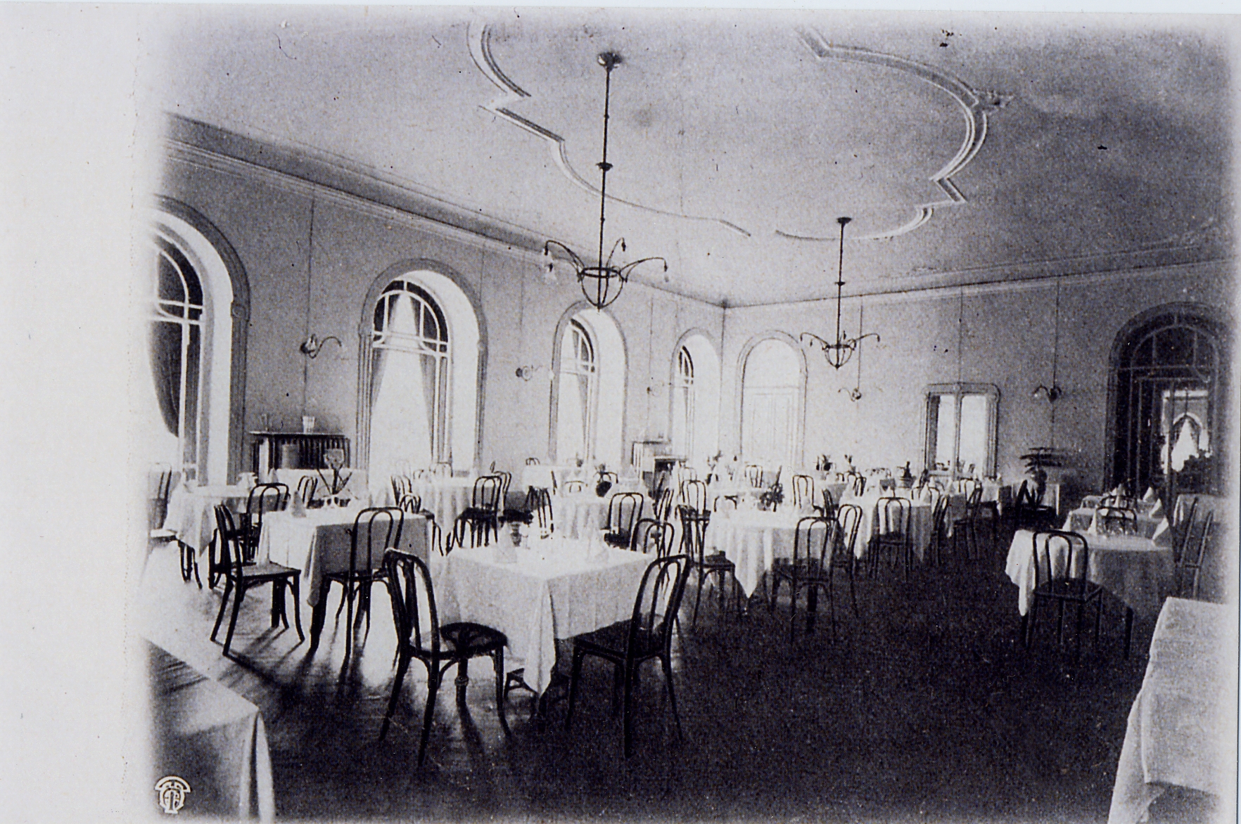 a room with tables and chairs