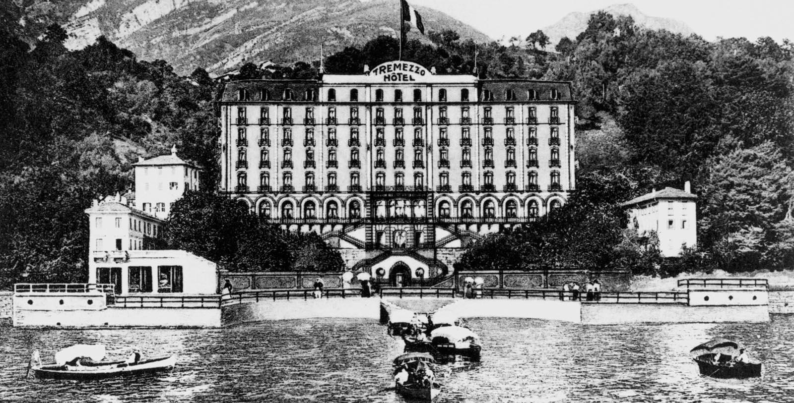 a hotel with a river in the background