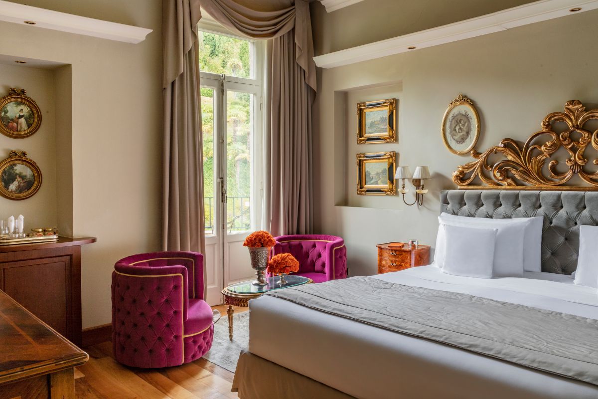 a bedroom with a bed and a chair