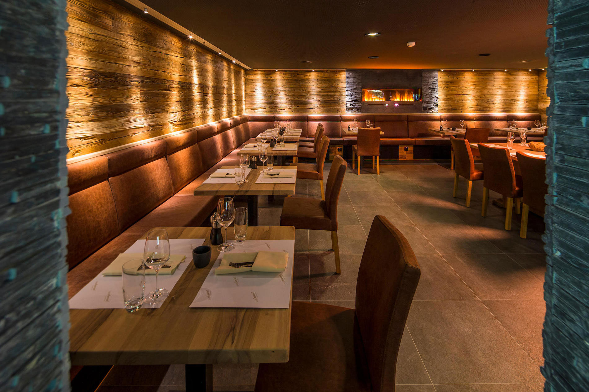 a restaurant with tables and chairs