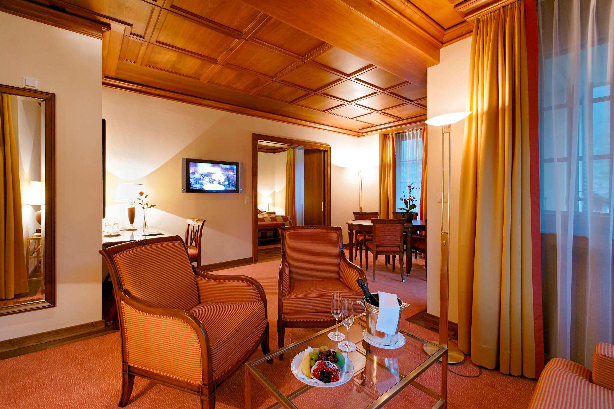 a room with a table and chairs