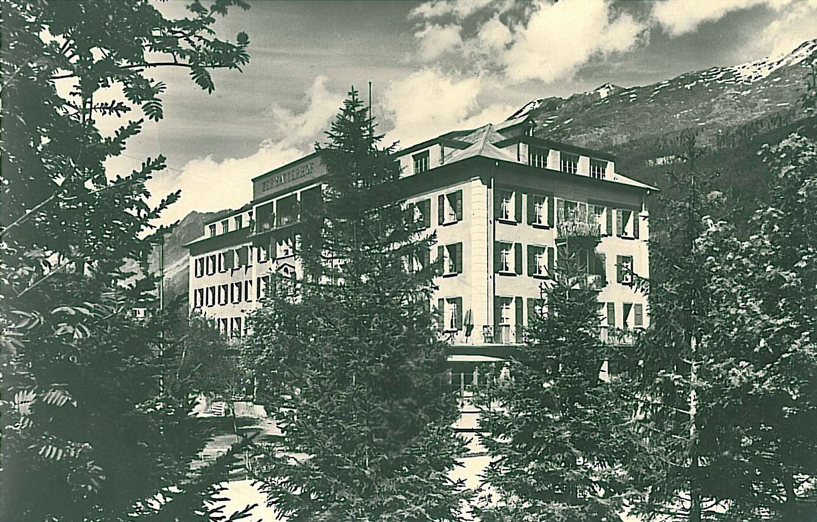 a building with trees in front of it
