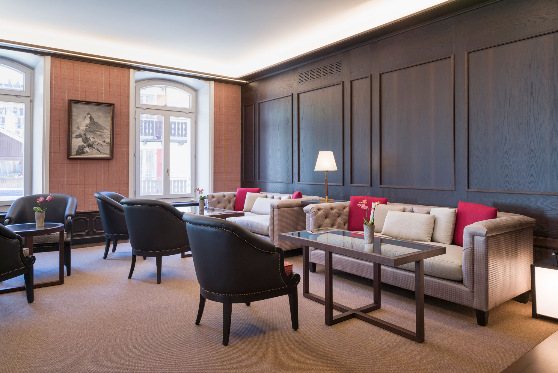 a room with couches and chairs