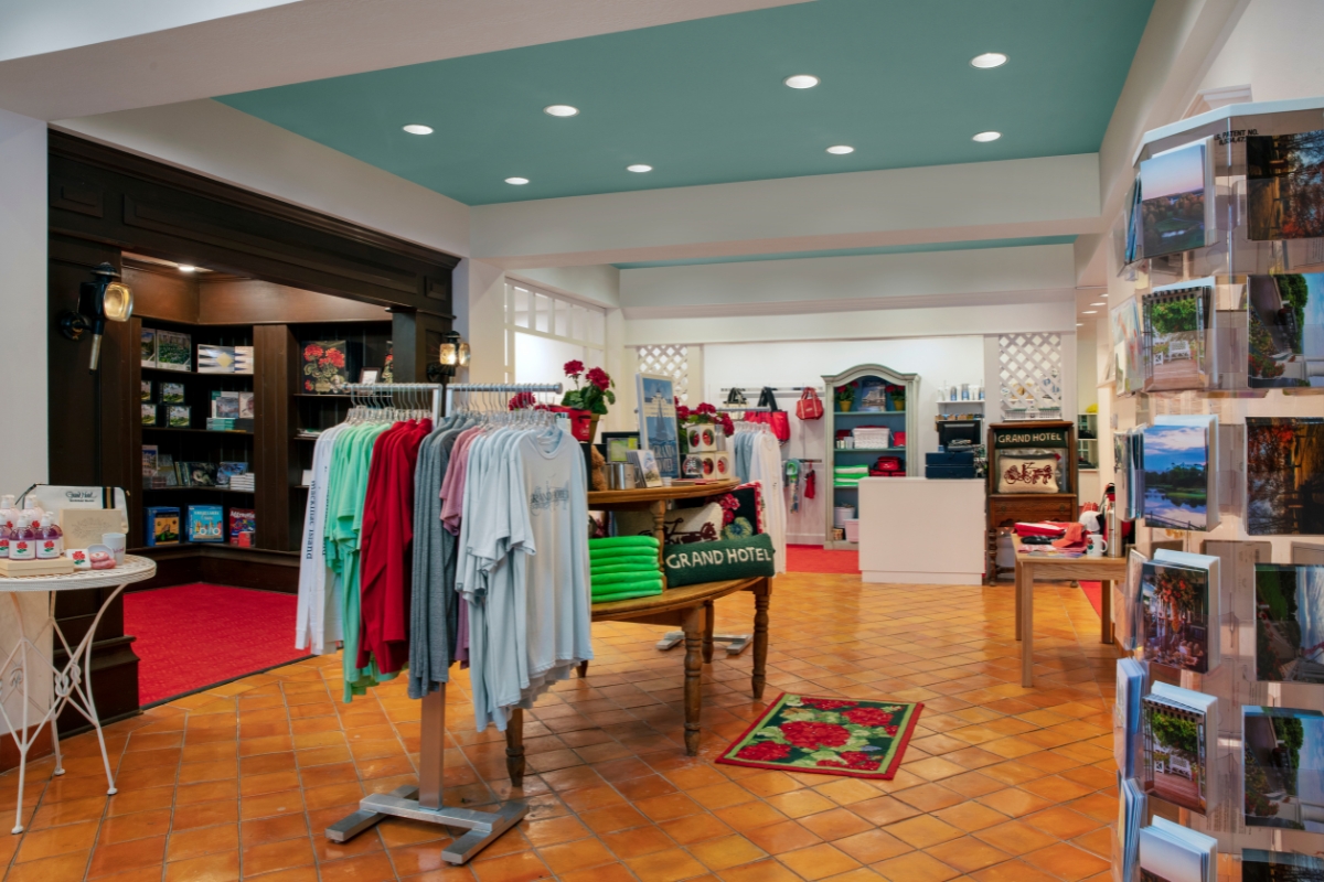 a store with clothes on swingers