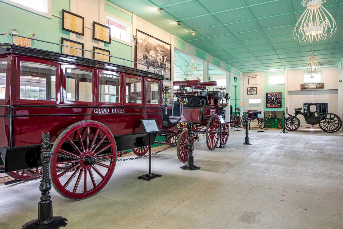 a horse carriage in a room