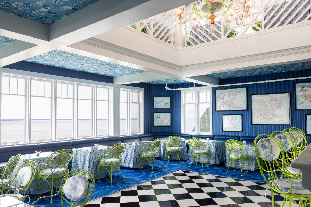 a room with blue and green chairs and a checkered floor