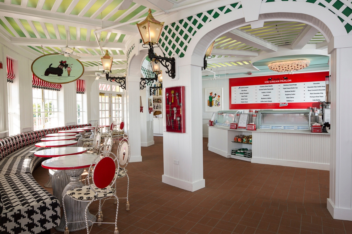 a restaurant with tables and chairs
