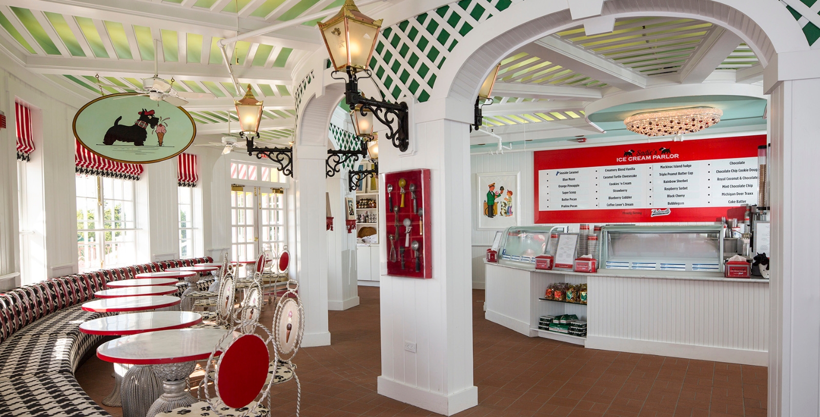 a white and red restaurant with a red and green ceiling