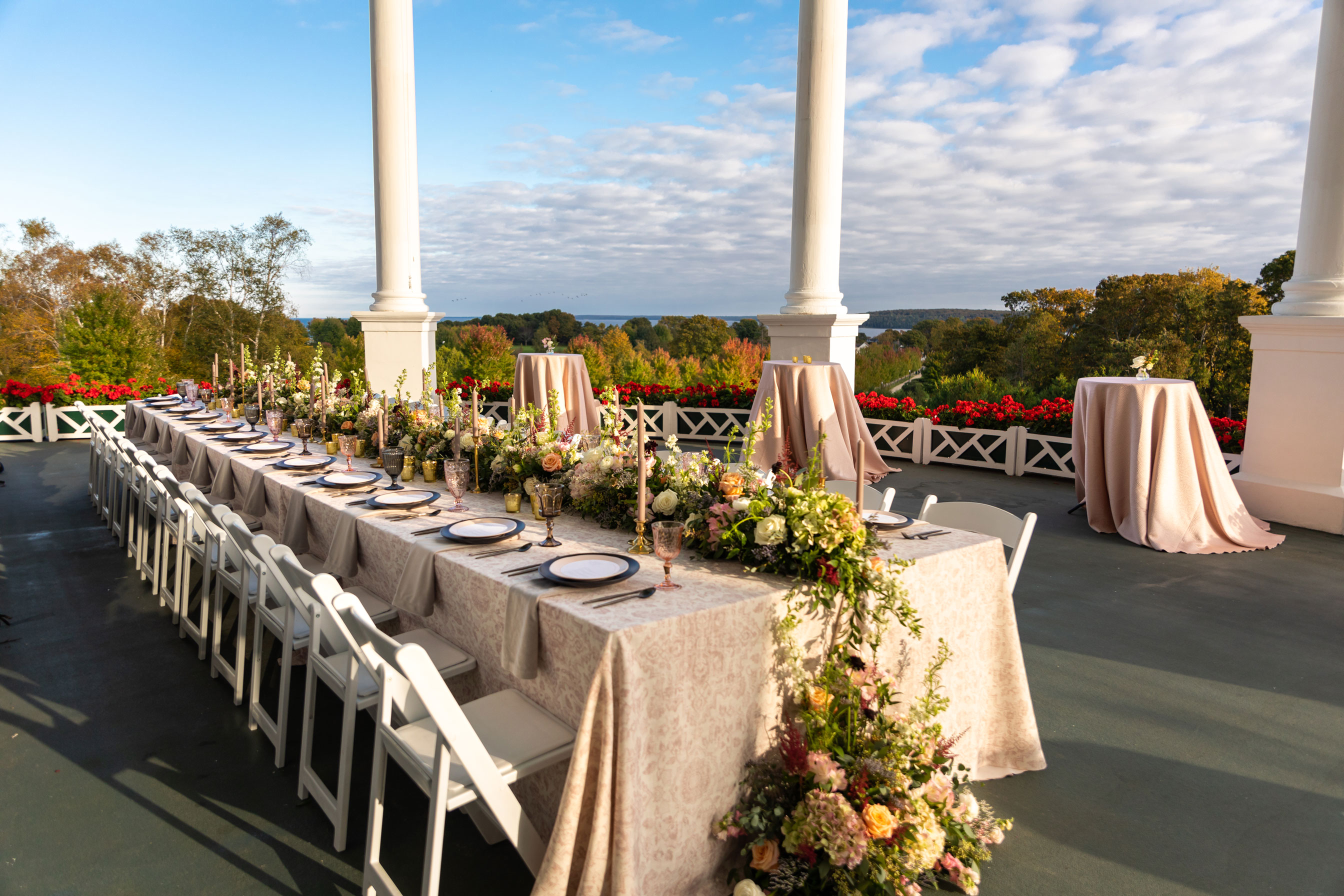 a long table set for a wedding reception