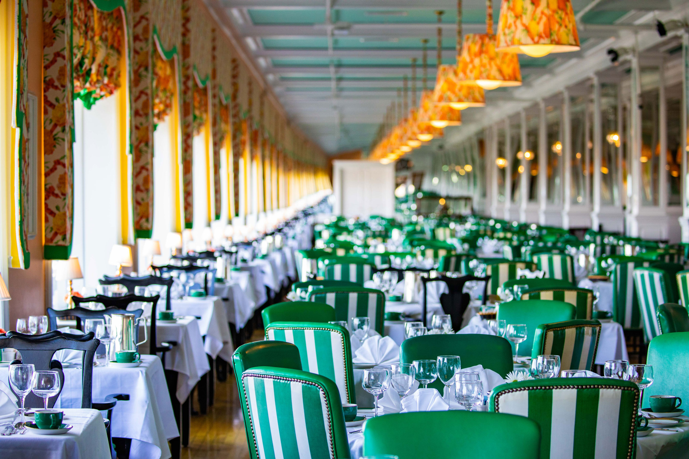 a room with tables and chairs