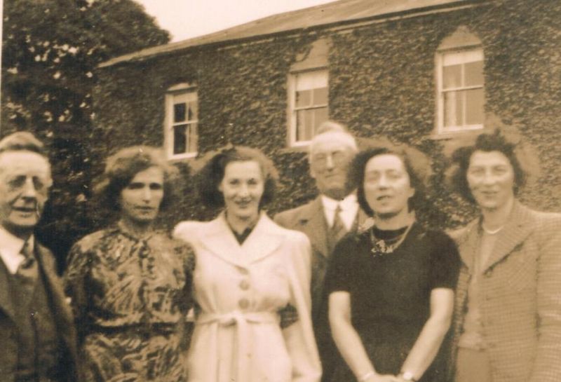 a group of people posing for a photo