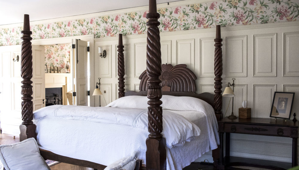 a bed with four posts