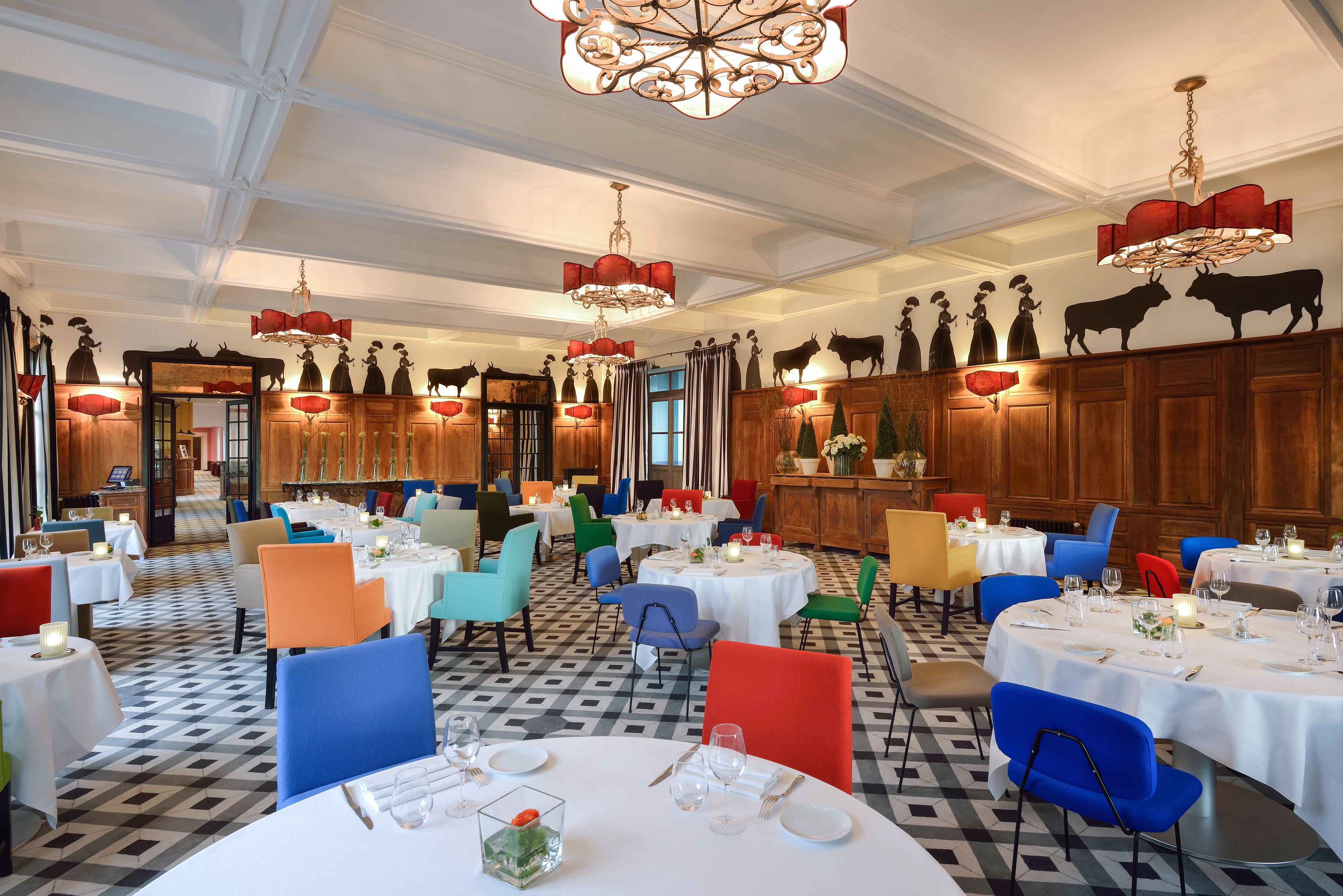 a room with tables and chairs