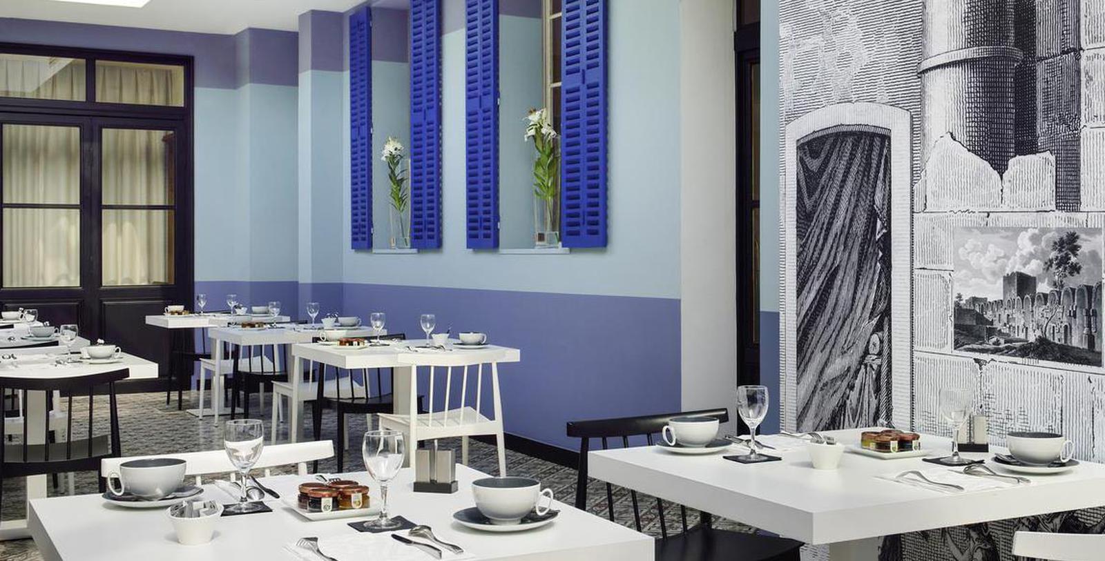a room with tables and chairs