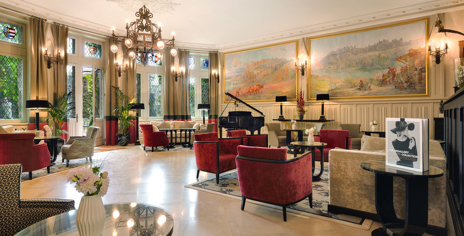 a room with a piano and chairs