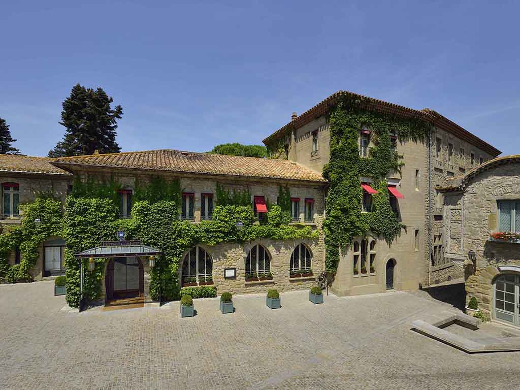 a building with ivy on the side