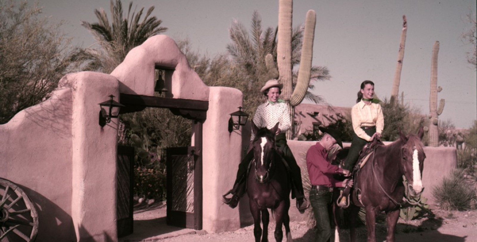 a group of people riding a horse