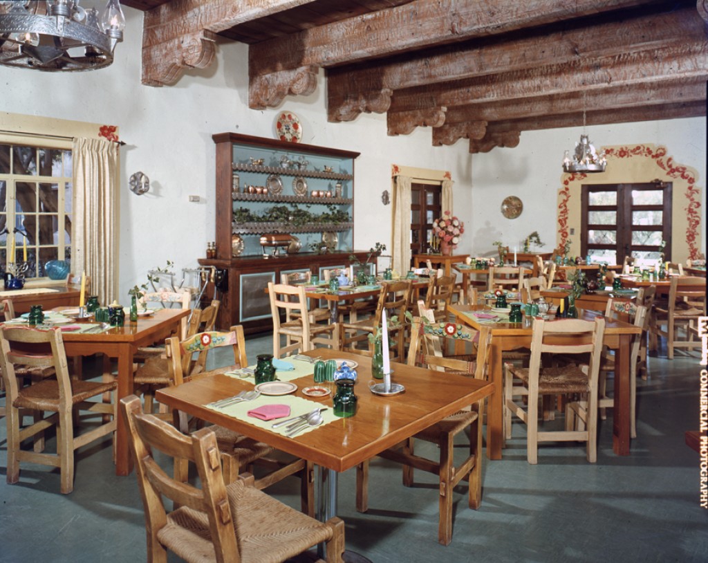 a room with tables and chairs