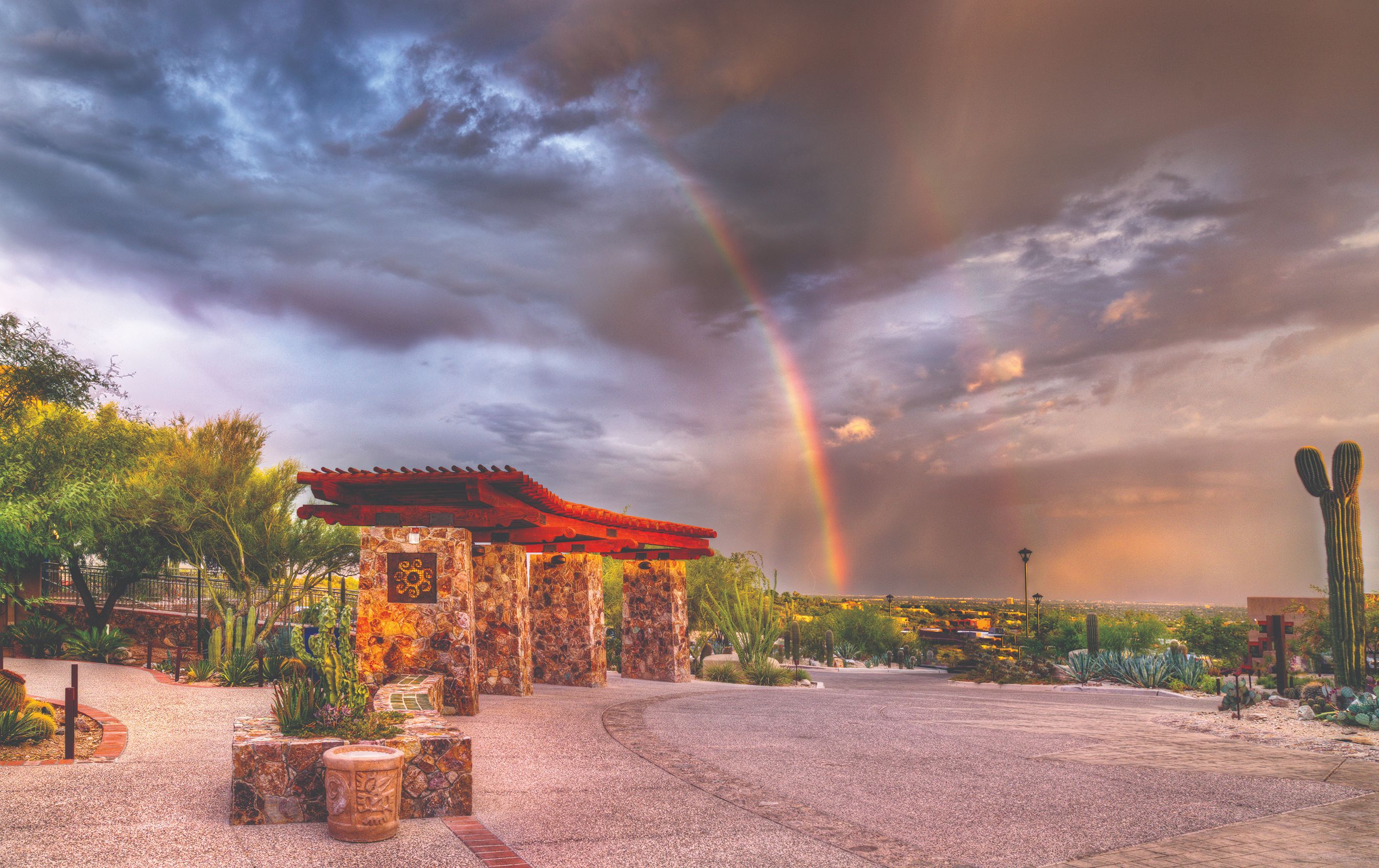 a rainbow over a building