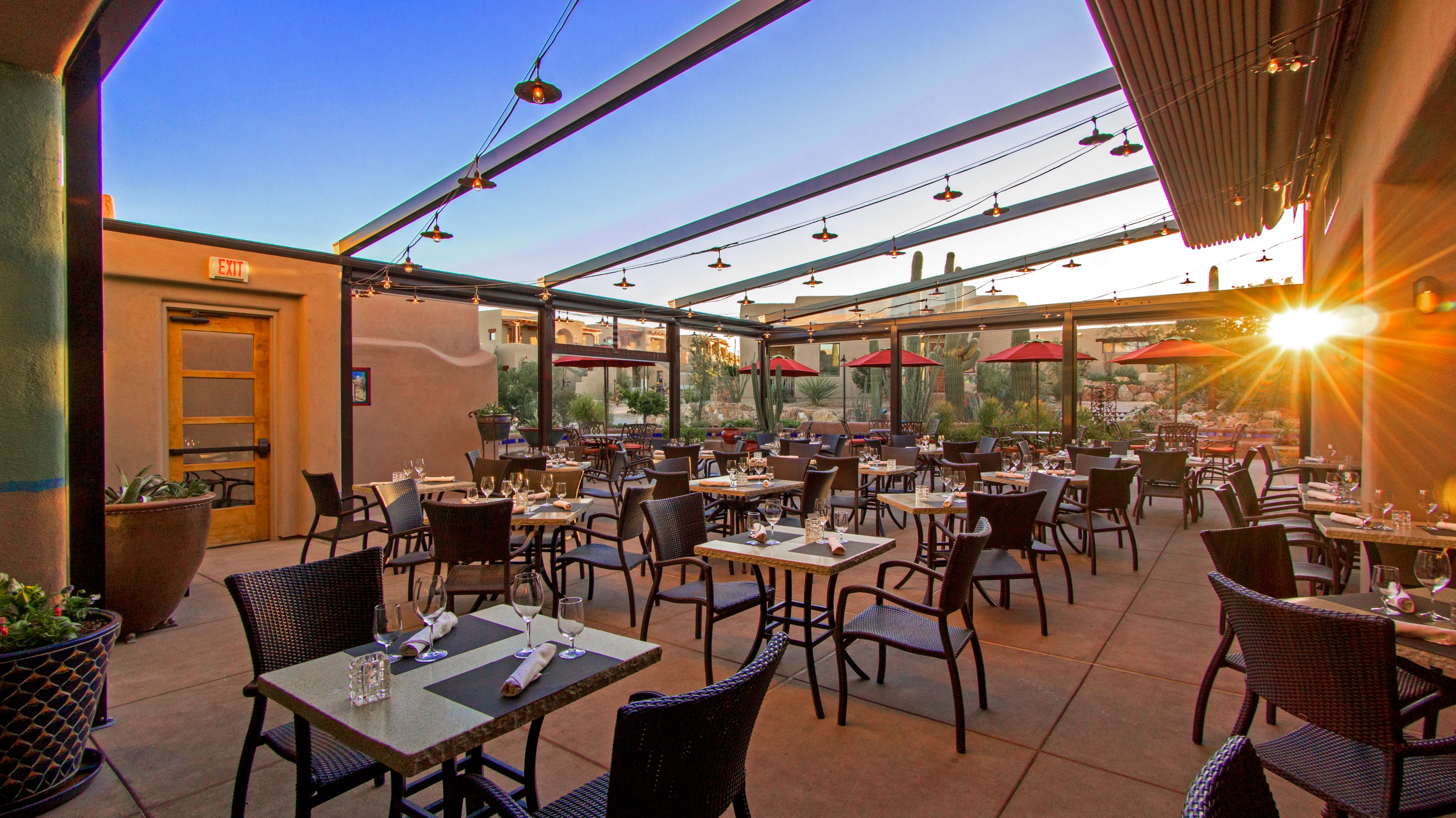 a restaurant with tables and chairs