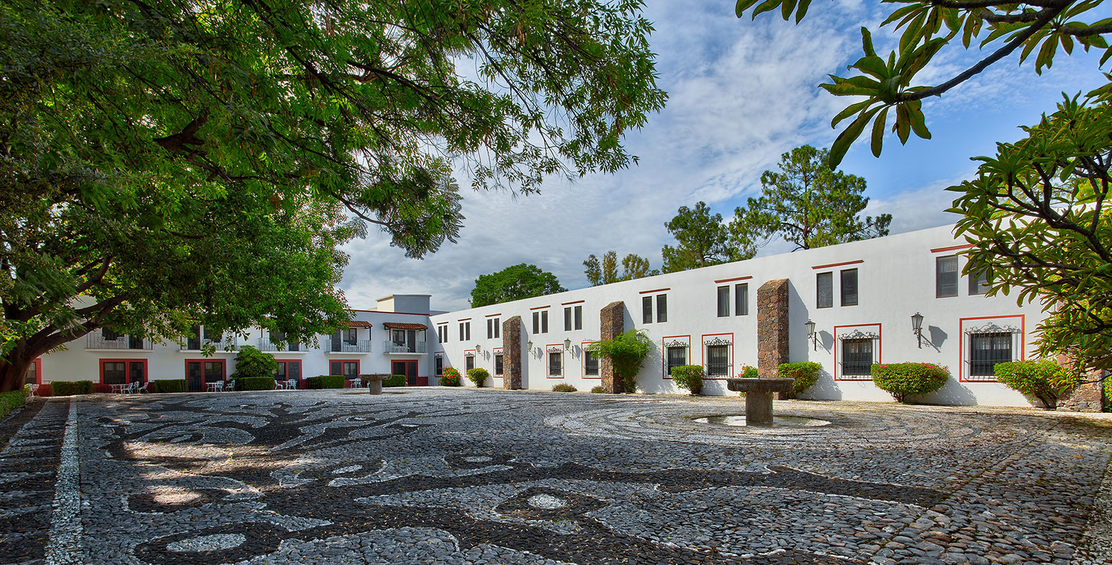 a building with a stone paved area
