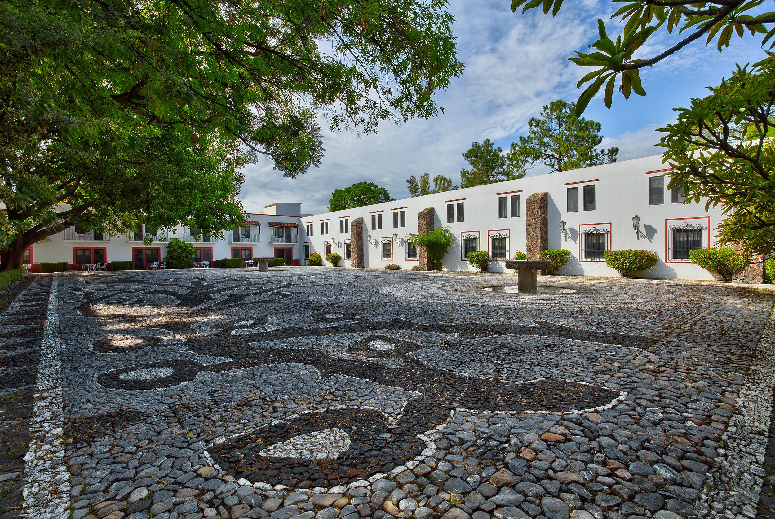 a building with a stone courtyard