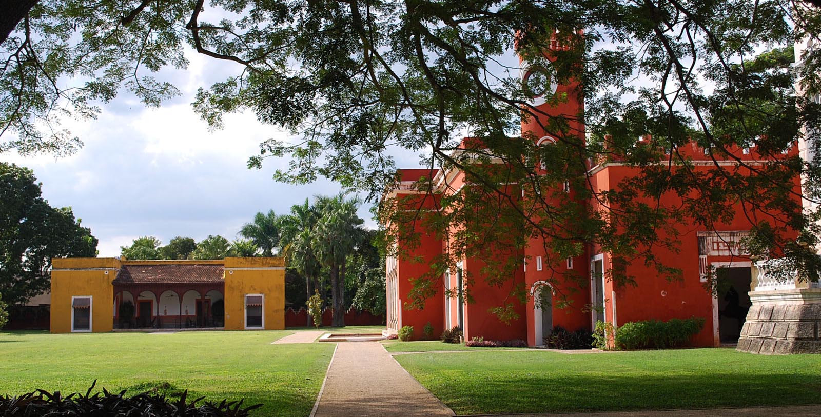 a red building with a clock tower