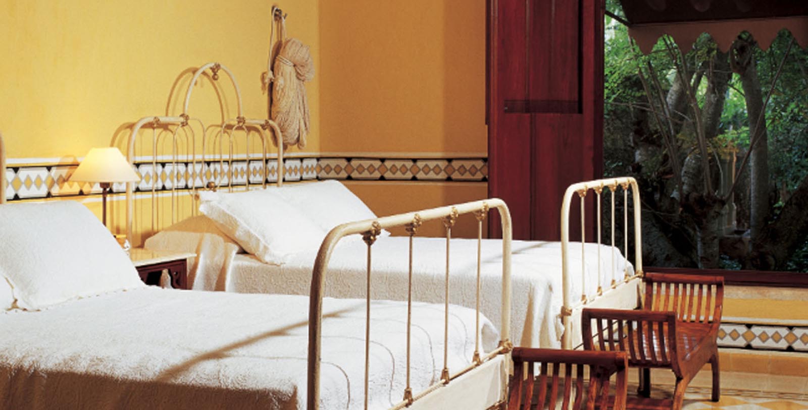 a bedroom with two beds
