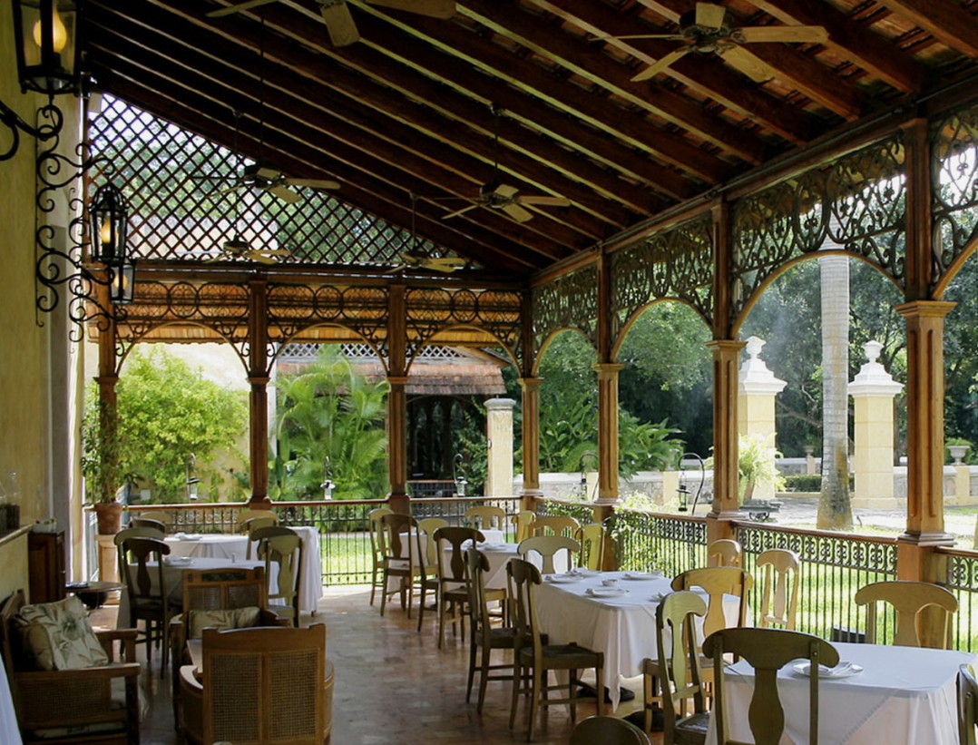 a restaurant with tables and chairs