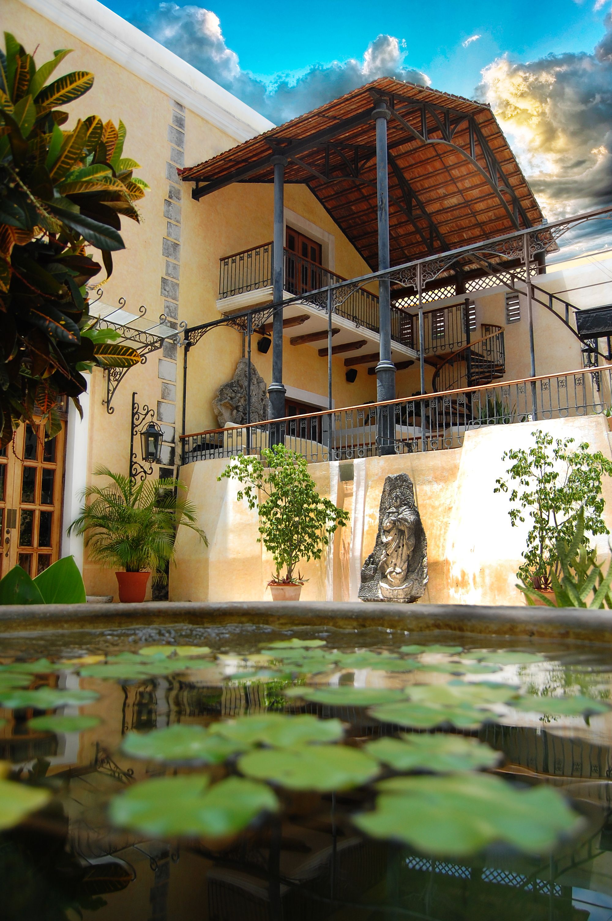 a fountain in front of a house