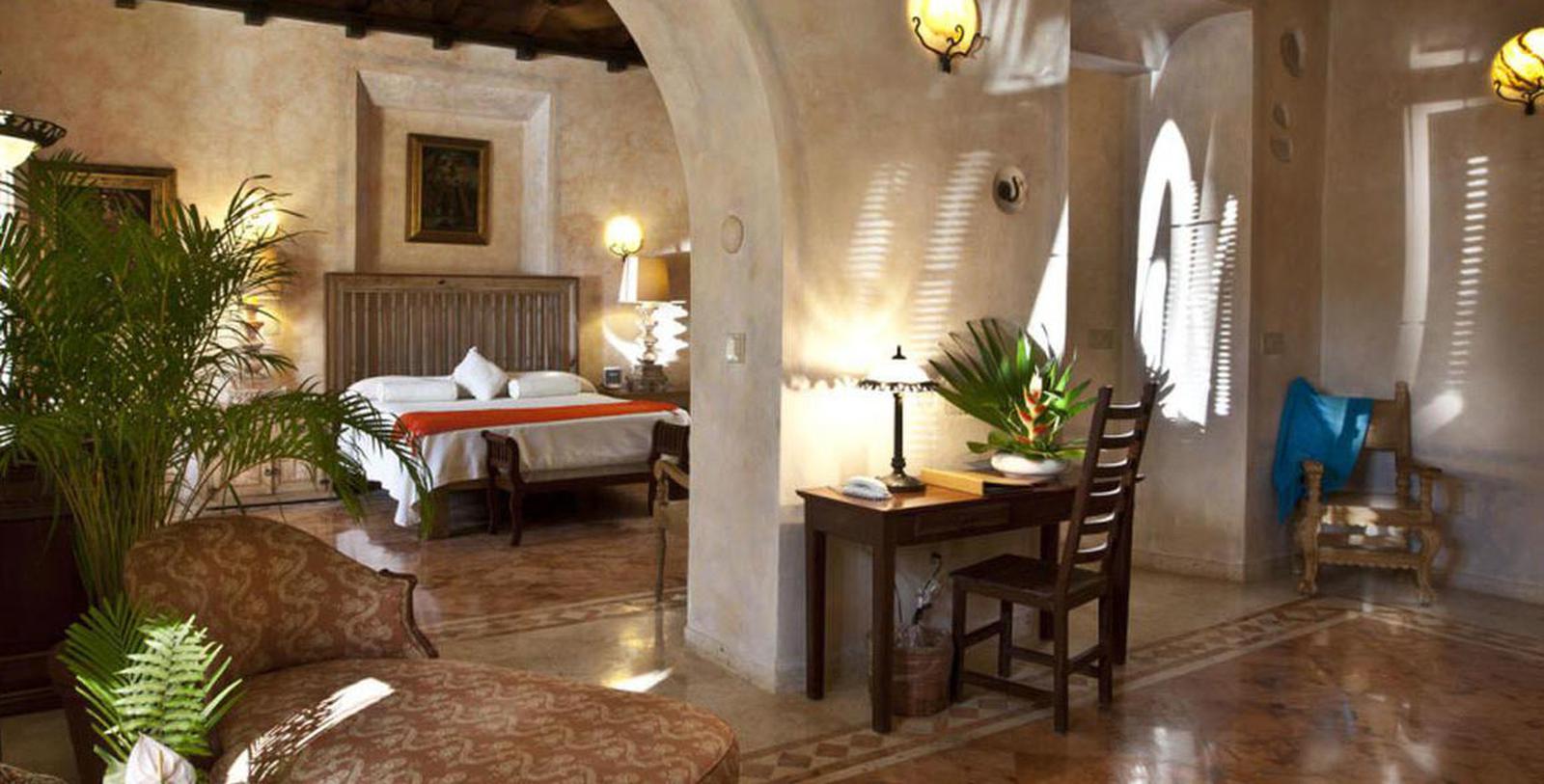 a room with a bed and a table