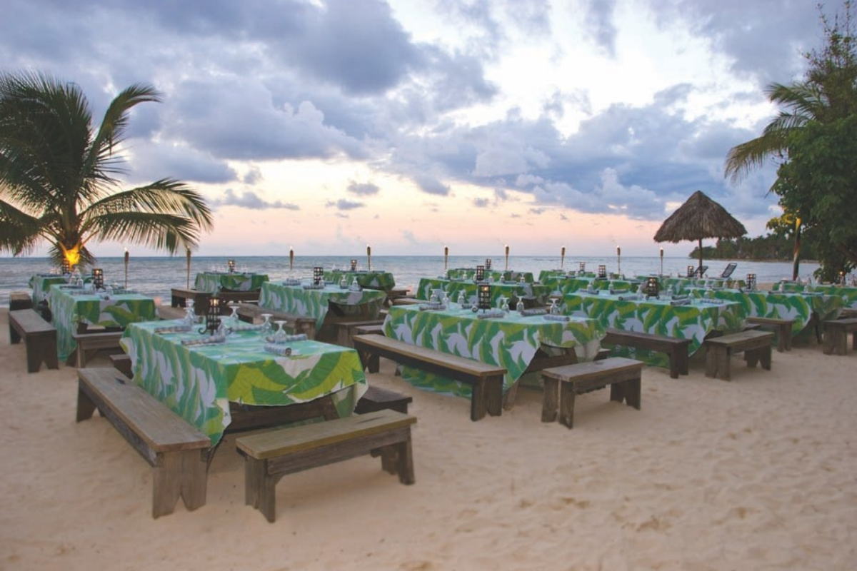 long shot of tables on a beach