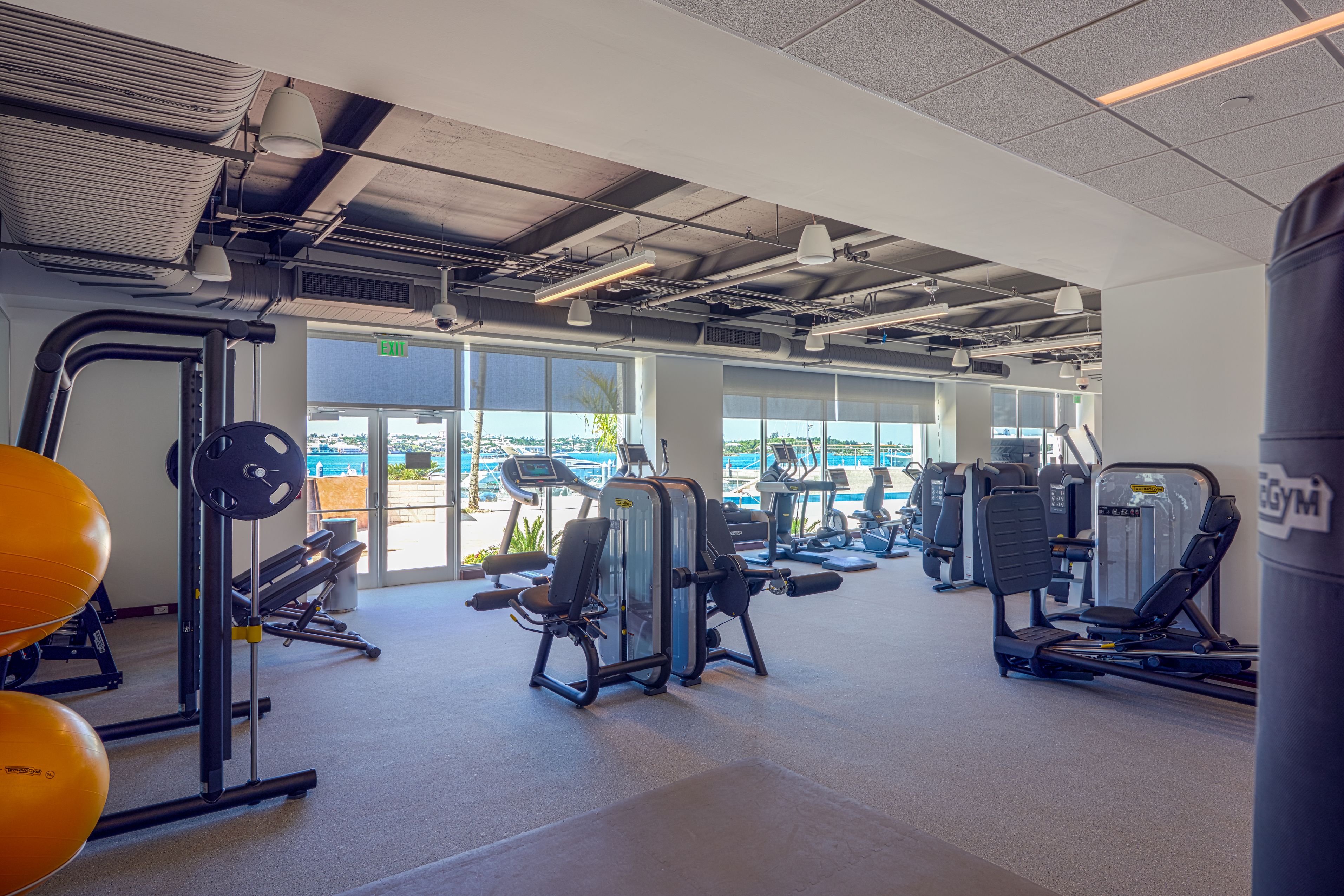 a large gym with exercise equipment