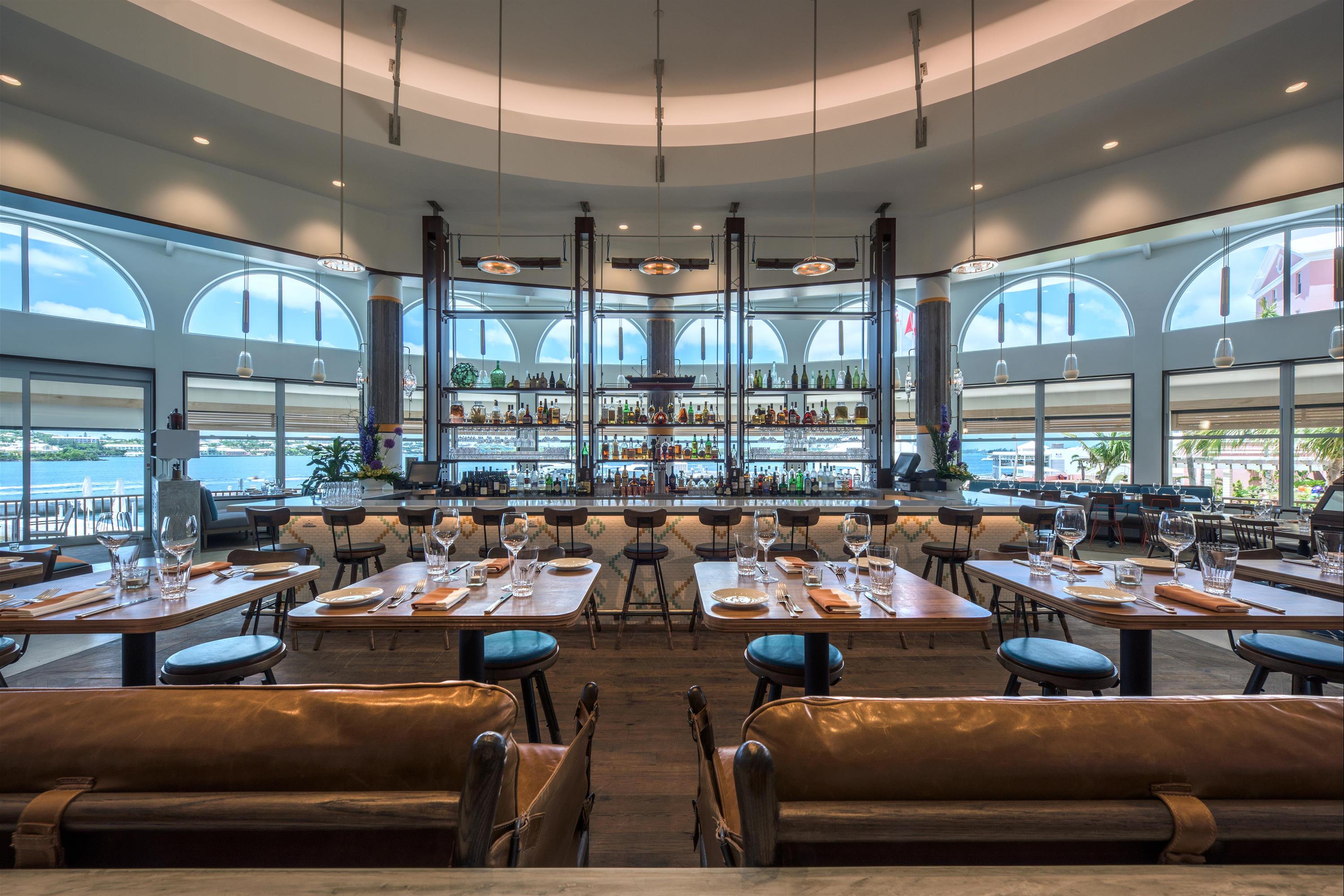 a restaurant with tables and chairs