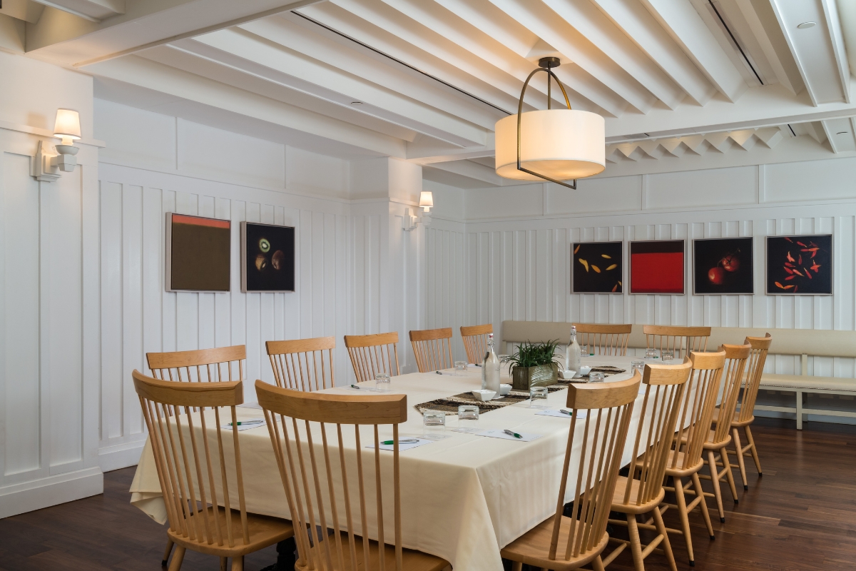 a room with a table and chairs