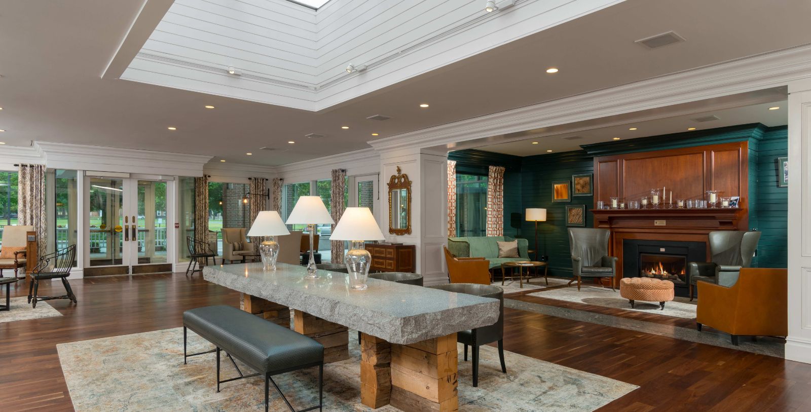 a room with a large table and chairs