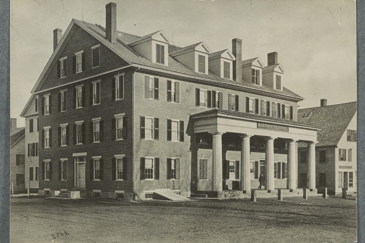 a large brick building with columns
