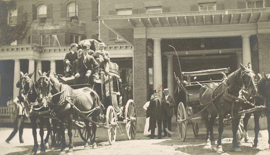 a group of people on a horse carriage