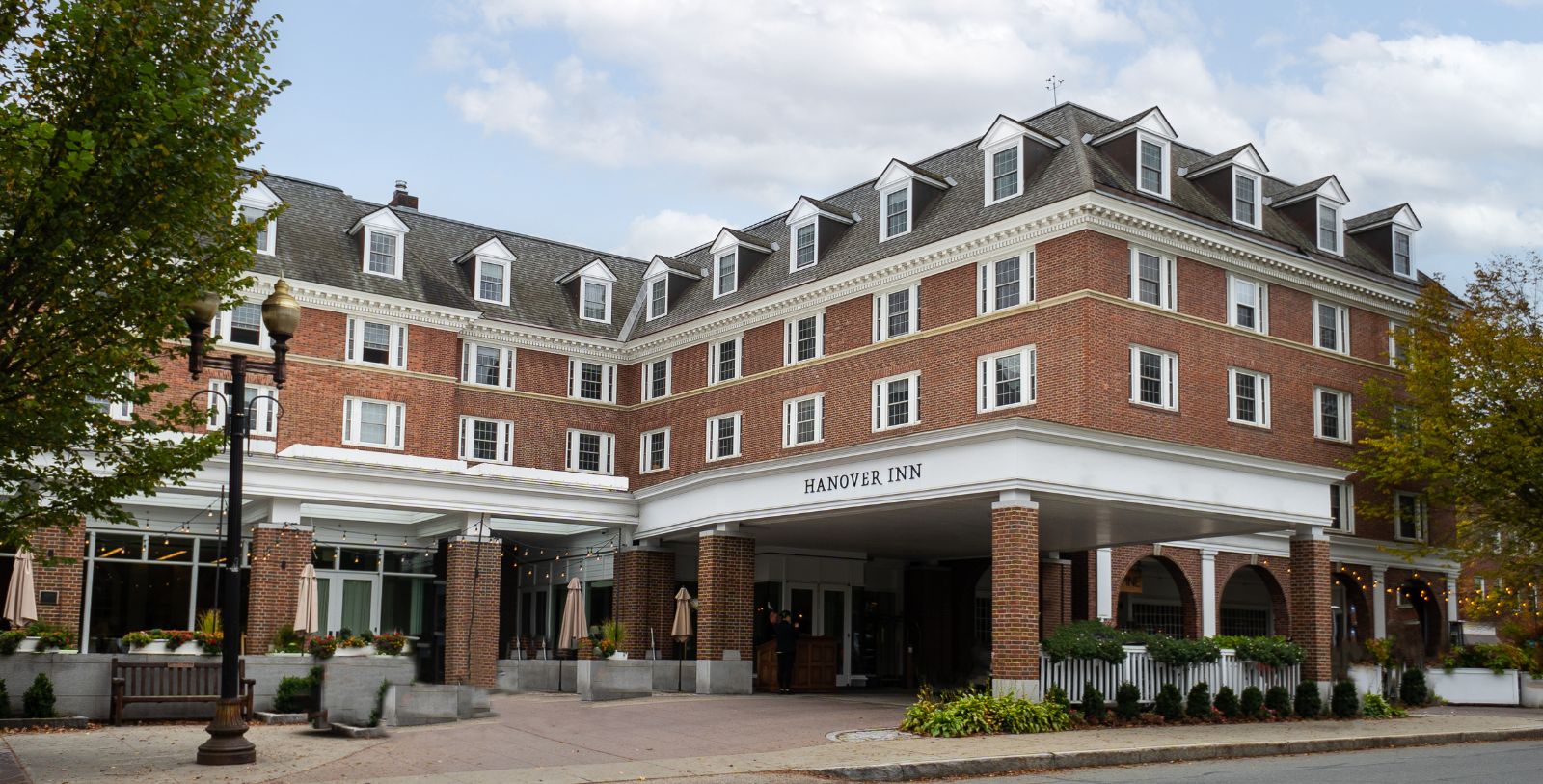 a large brick building with white trim