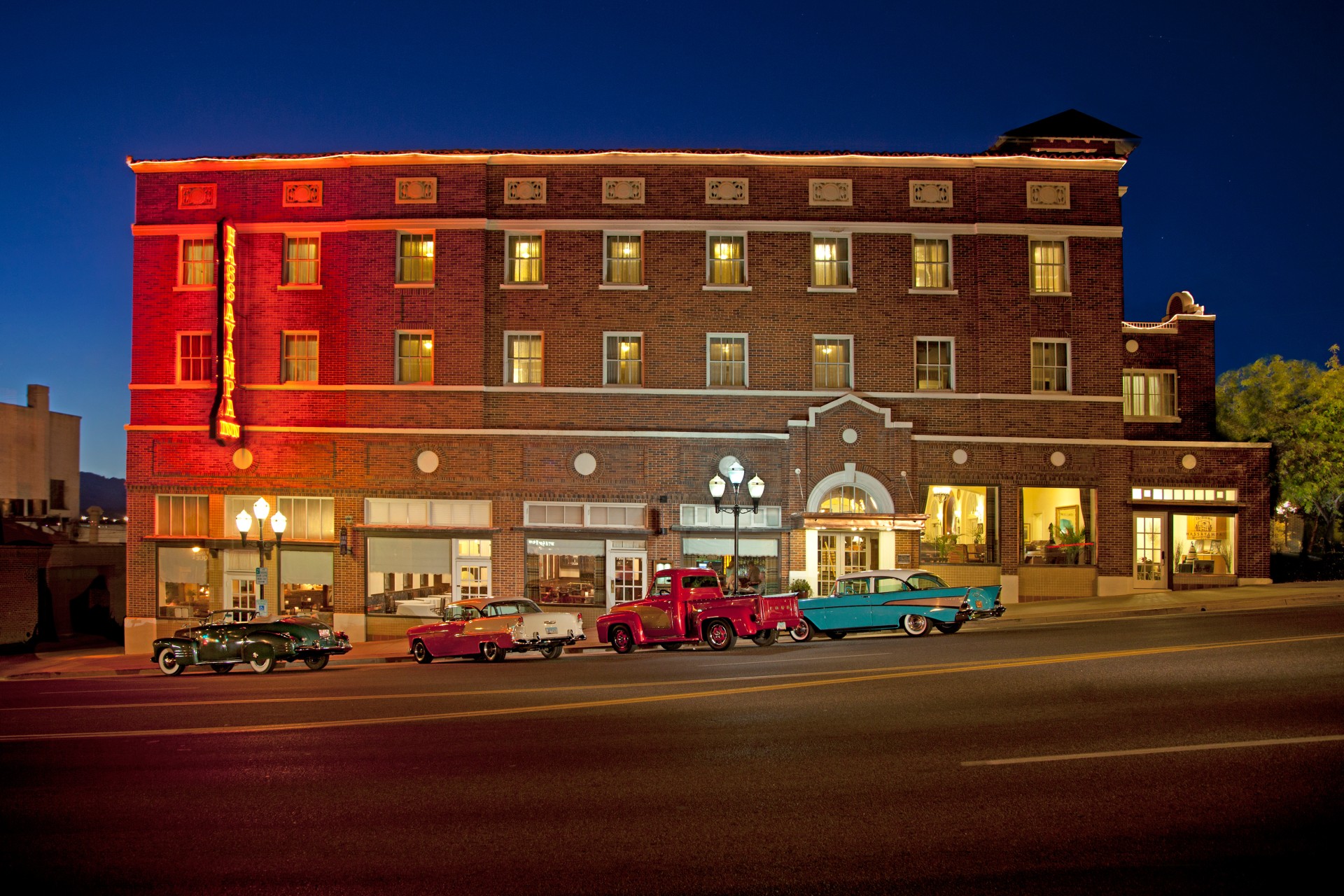 a building with cars parked in front of it